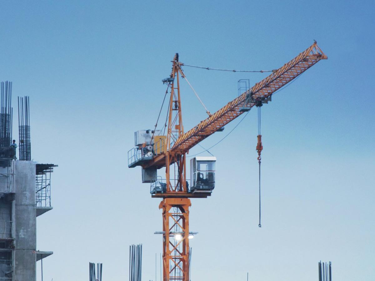 Tower crane over a building under construction